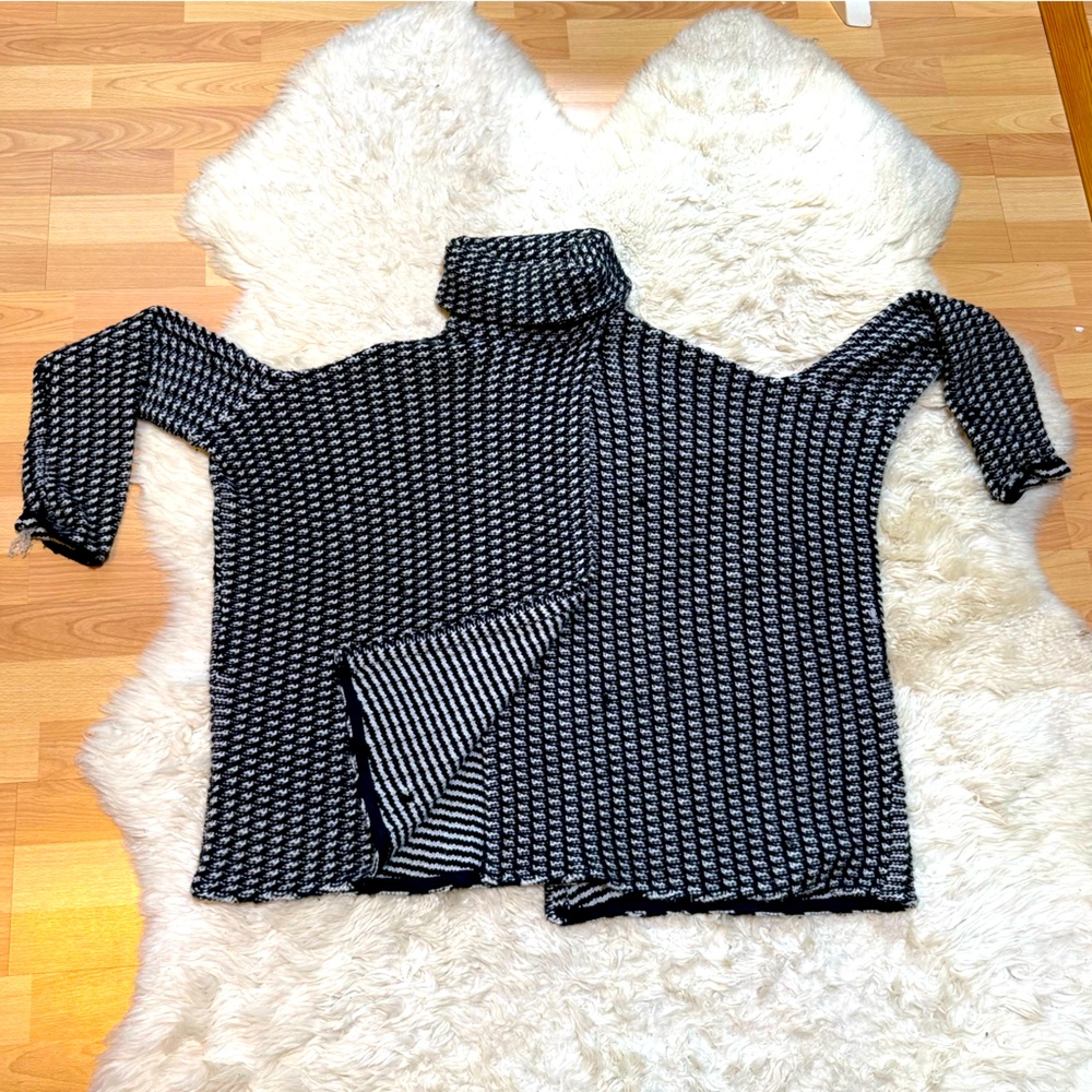 Dramatically swingy designer novelty sweaterknit turtleneck cape